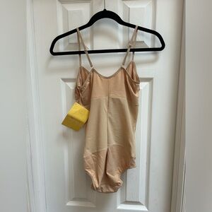 One piece shaper with snap bottom